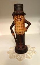 Planters Nuts Mr. Peanut Cast Metal Bank Figure Top Hat Cane Brown Tan 5 1/2 in picture