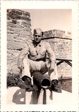 Vintage WWII Era Photo Soldier Serviceman Portrait Military Uniform Cannon Fort picture