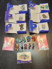 Dragons and Beasties pin collection with and without backings picture