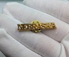 Vintage Nebraska State Name Script Gold Tone Souvenir Lapel Pin picture