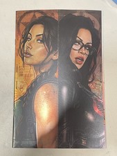 G.I. JOE x TOMB RAIDER #1 CEDRIC POULAT NYCC 2026 VIRGIN FOIL LTD 500 NM picture