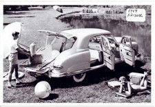 People Camping with 1949 Kaiser Automobile Photo picture
