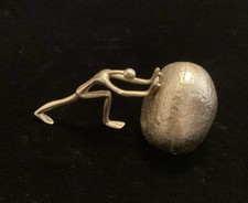 Vintage Ted Arnold Gold Paperweight Man Pushing Rock picture