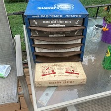 Vintage Sharon’s Bright Line Fastener Center Drawer CabinetDisplay with Bolts . picture