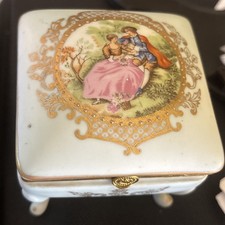 Vintage porcelain footed trinket box decorated in a romantic Rococo style. picture