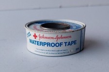 JOHNSON & JOHNSON WATERPROOF TAPE TIN. UNUSED. ADVERTISING COLLECTIBLE picture
