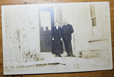 Postcard Old Vintage Card B/W Real Photo Man a Woman in front of Home picture