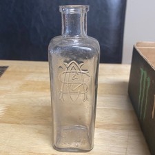 Antique A Schilling and Co Embossed Glass Bottle Vintage Extract Apothecary l picture