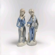 Porcelain Llarado like figurines girl w umbrella blowing kiss boy w top hat picture