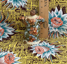 Hawaiian Andrea of Kona clay painted womam with  beautiful flower dress picture