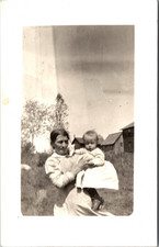 Postcard Real Photo RPPC Woman Holding Child in Yard Unposted picture