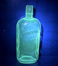 Vintage Clear Glass Quart Bottle Has a Green Manganese Glow picture
