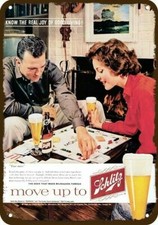 1960 SCHLITZ BEER Vintage Look DECORATIVE METAL SIGN - MAN & WOMAN PLAY MONOPOLY picture