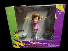 Harry Potter CYCLING DOLORES UMBRIDGE RARE Universal Weasleys' Wizard Wheezes picture