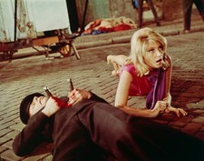 Italian actor Monica Vitti lies close to the ground beside a de - 1966 Old Photo picture