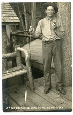 RPPC NY Adirondacks Big Moose Lake View Lodge Fisherman at Boathouse Herkimer Co picture