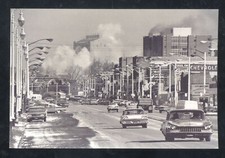 REAL PHOTO WYANDOTTE MICHIGAN DOWNTOWN STREET SCENE CARS POSTCARD COPY picture
