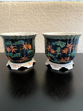 A pair of Chinese vintage black glazed porcelain pots painted w/ gold fish  picture
