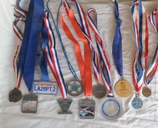 Lot of (11) Vtg LA Marathon (mostly) Finisher Medals years 88-95 picture