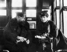 Tram driver and woman conductor having lunch break at the terminal Old Photo picture