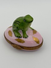 Love trinket boxes?  Adorably happy frog sitting on a pink and gold pillow  :) picture