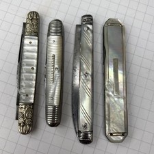 Lot Of Vintage Fancy Pearl Handle Knives picture