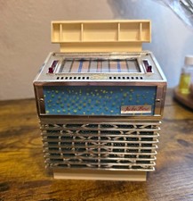 Vintage miniature jukebox musical box/coin bank. Have Not Tried It. From 1970's picture