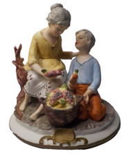 Vintage Porcelain grandmother and boy Figurine 7