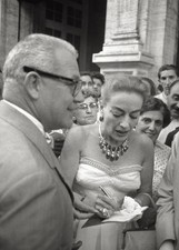 The American actress Joan Crawford signing autographs among crowd - Old Photo picture