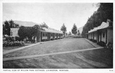 Willow Park Cottages Livingston Montana Partial View Mountains Statue Postcard picture
