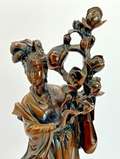 Asian Figurine with Lotus Flower Bundle picture