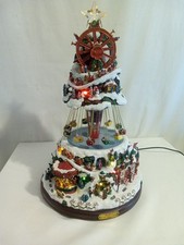 Thomas Kinkade Grand Winter Festival Christmas Tree. Lights And Music Works.  picture