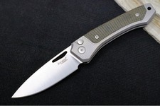 Lionsteel Twain Solid Button Lock Folder - Magnacut Steel / Gray Titanium Handle picture