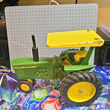 ERTL 1/16 scale John Deere 3020 narrow front, green ROPS bar, yellow canopy  picture