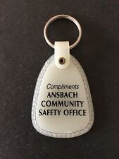 Vintage Keychain ANSBACH COMMUNITY SAFETY OFFICE Key Ring Glow In Dark Fob USA picture