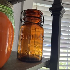Atlas Amber Glass E-Z Seal Qt. Jar w/ Wire Bail Lid, Embossed Text 7.5” tall picture
