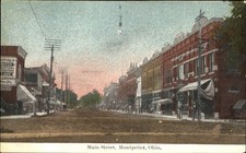 Main Street ~ Montpelier Ohio OH ~c1910 unused postcard~ dirt road antique light picture