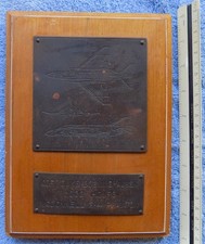 McDonnell F-4 Phantom 1,000 Hours - 1970s Vintage Wood and Bronze Wall Plaque picture