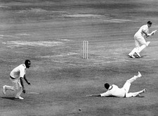 Lance Gibbs goes down but fails to stop a cut by Colin Cowdrey off- Old Photo picture