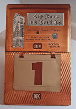 1950'S CITY BANK AND TRUST CO JACKSON MICHIGAN VINTAGE METAL DAILY DATE CALENDAR picture