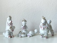Vintage Set of 3 Japan Poodle Figurines w/Spaghetti Trim & Applied Pink Flowers picture