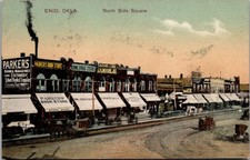Enid Oklahoma North Side Square Storefronts Awnings Streetcar Track Postcard picture