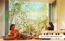 Woman lounging floor a record player text reads every home should - Old Photo picture