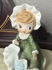 Vintage Porcelain Girl Figurine Green Dress and Bonnet Blonde Hair Decoration picture