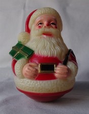 Vintage Roly Poly Plastic Santa Claus with Christmas Gift Wobbler Toy, 1950's picture