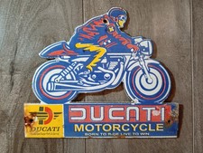 This Vintage DUCATI Motorcycle Porcelain Enamel Sign measures 7