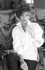 Italian actress Monica Vitti sitting with a cigarette at home 1967 Old Photo picture