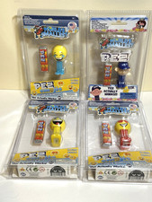 Group of 4 worlds smallest Pez picture