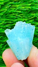 75 carats beautiful top blue cluster aquamarine cluster spray combine with black picture