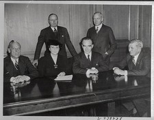 Frances Perkins Secretary of Labor is shown in conference with Gov- Old Photo picture